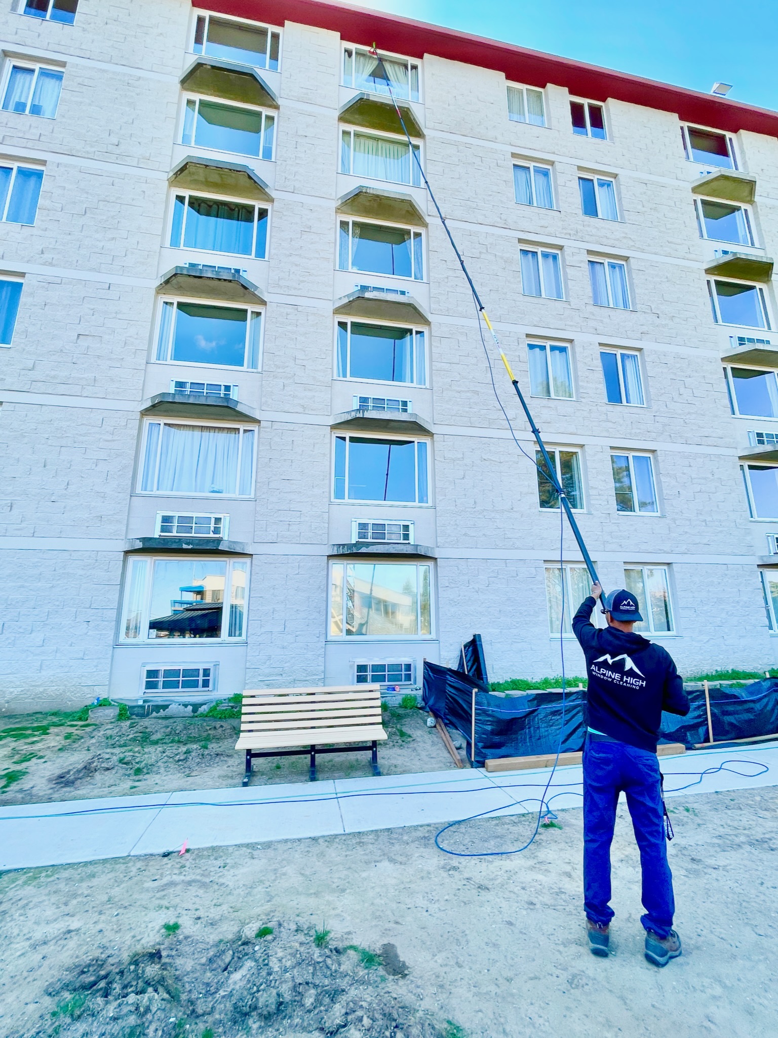 Water-fed pole window cleaning for commercial buildings in North Central Washington