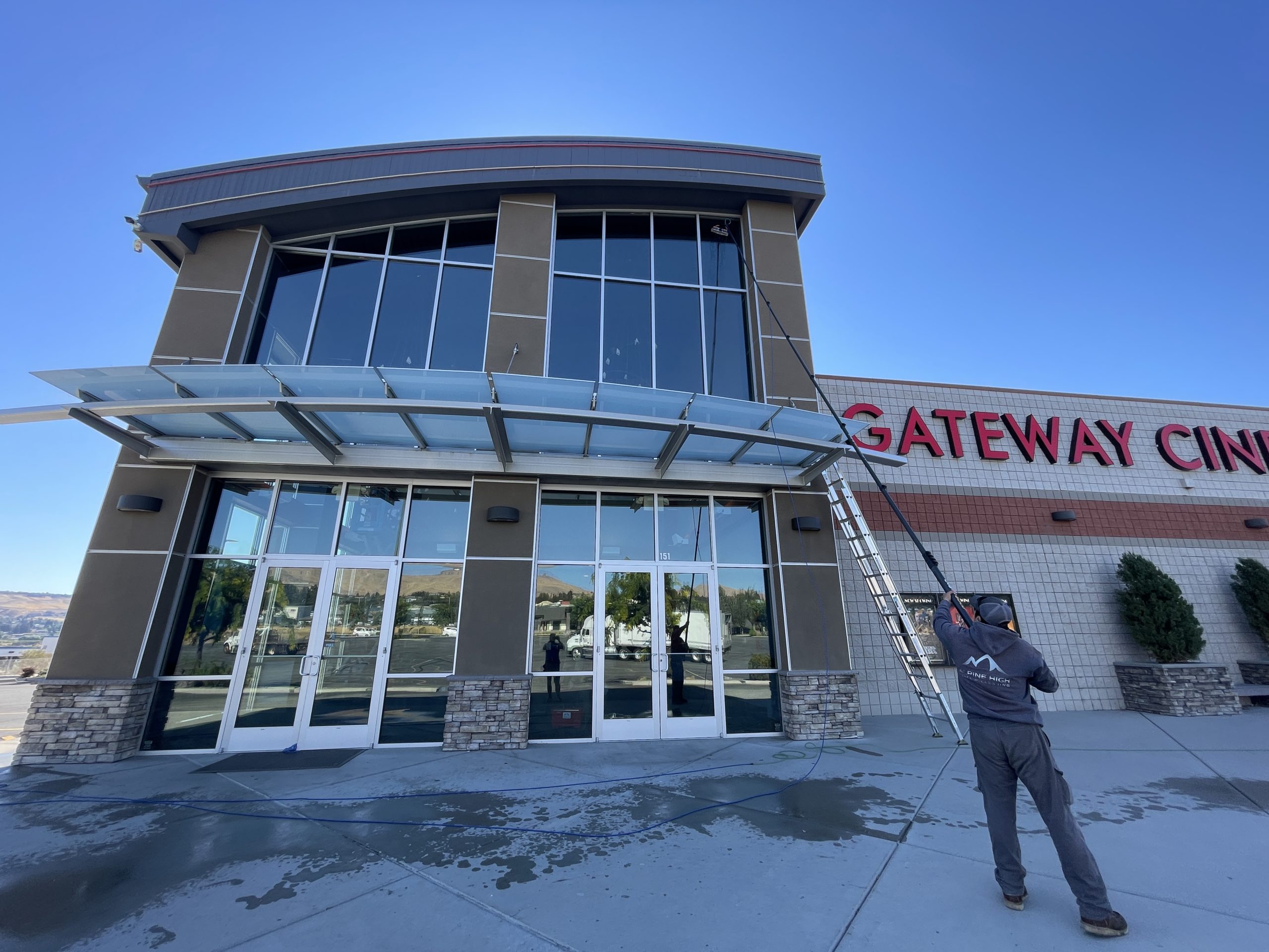 Water-fed pole window cleaning for commercial buildings in North Central Washington